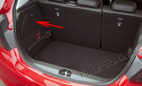 The location of the fuses in the trunk: Opel/Vauxhall Corsa D (2006-2014)