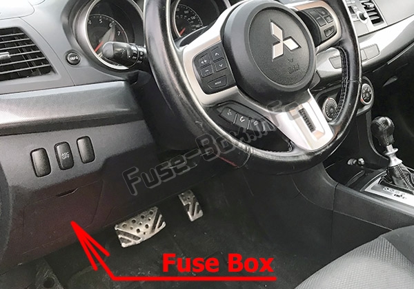 The location of the fuses in the passenger compartment: Mitsubishi Lancer (2008-2017)